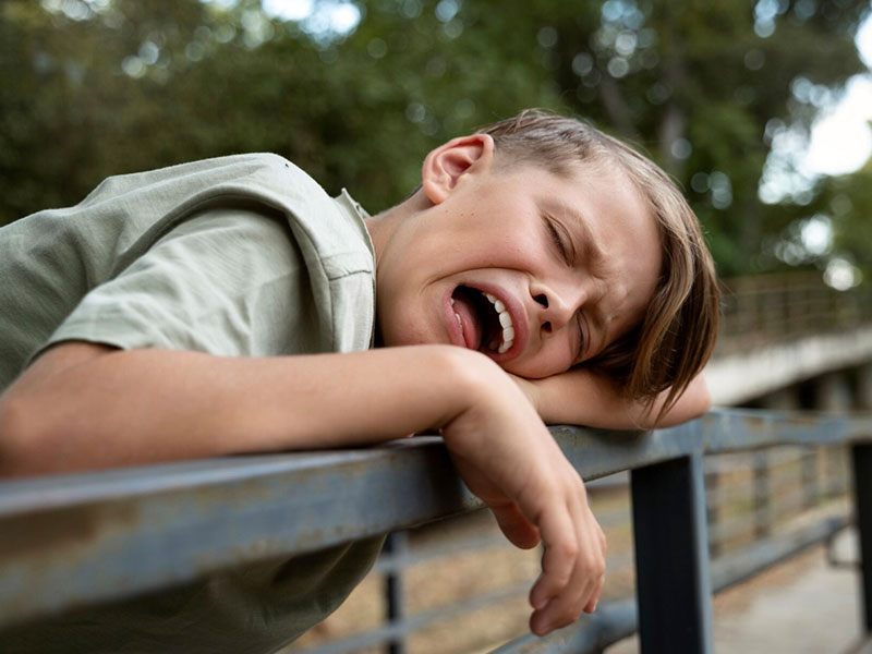 boy crying for help