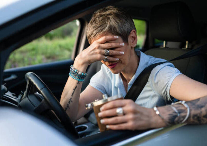 Woman Crying in Car